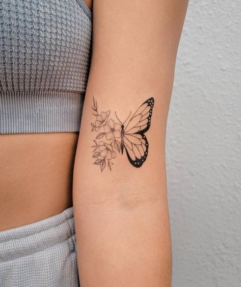 Half butterfly half flower tattoo placed on the bicep. Butterfly Half Flower Tattoo, Half Butterfly Half Flower Tattoo, Half Flower Tattoo, Half Butterfly, Butterfly With Flowers Tattoo, Small Tattoos For Women, Half Flower, Flower Tattoo Back, Butterfly And Flowers