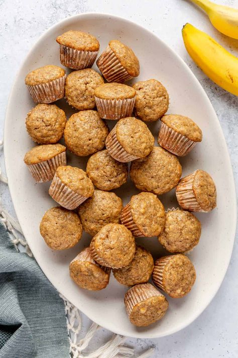 These mini banana muffins are just the right size for snacking or a grab-and-go breakfast. Easy to make, full of banana flavor, and so good! | Mini Banana Muffin Recipe | Mini Banana Bread Muffins | Bite-sized Banana Muffins | Baby Banana Muffins, Banana Mini Muffins Healthy, Spinach Banana Muffins, Baby Muffins Banana, Oatmeal Banana Muffins, Mini Muffins Recipes, Mini Breakfast Muffins, Mini Banana Muffins Toddler, Toddler Peanut Butter Banana Muffins