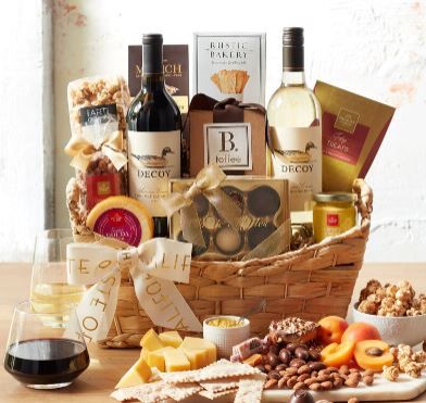 Gift Guide: The Best Gift Sets Of The Season | Prime Women Kos, Cheap Wine Basket Gift Ideas, Wine Gift Basket Ideas For Women, Wine Raffle Basket Ideas, Liquor Basket Ideas For Raffle, Wine Basket Gift Ideas Diy Budget, Charcuterie Board Gift Basket Ideas, Charcuterie Gift Basket, Alcohol Basket