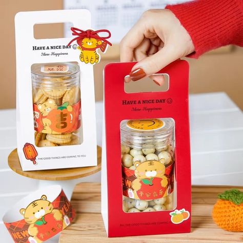 Doll Box Packaging Design, Chinese Hampers Ideas, Cny Hampers Idea, Cny Cookies Packaging, Food Hampers Packaging, Cookie Jar Packaging, Cny Hampers Packaging Design, Ramadhan Hampers Packaging, Hampers Packaging Ideas