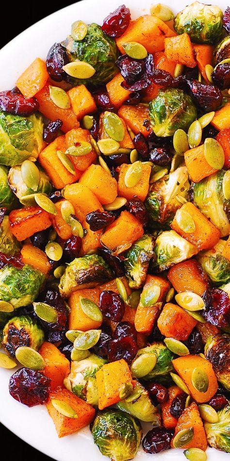 Roasted Brussels Sprouts Salad with Maple Butternut Squash, Pumpkin Seeds, and Cranberries – perfect Autumn salad, bursting with colors and flavors! Holiday side dish for Thanksgiving, Christmas, and New Year’s Eve. Healthy, delicious, gluten free recipe packed with veggies. I love this Brussels sprouts salad so much – to me it looks so much like...Read More Veggies Thanksgiving, Maple Butternut Squash, Brussels Sprouts Salad, Pasta Vegetariana, Resep Salad, Sprouts Salad, Holiday Side, Roasted Brussels Sprouts, Brussel Sprout Salad