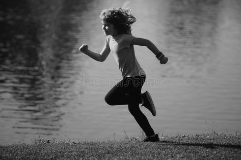 Child boy running or jogging near lake on grass in park. Sporty boy runner running in summer park. Active kids, sport stock images Child Running Reference, Kids Running Illustration, Running Reference, Running Poses, Running Hills, Running Illustration, Running Pose, Children Running, Sketch Reference