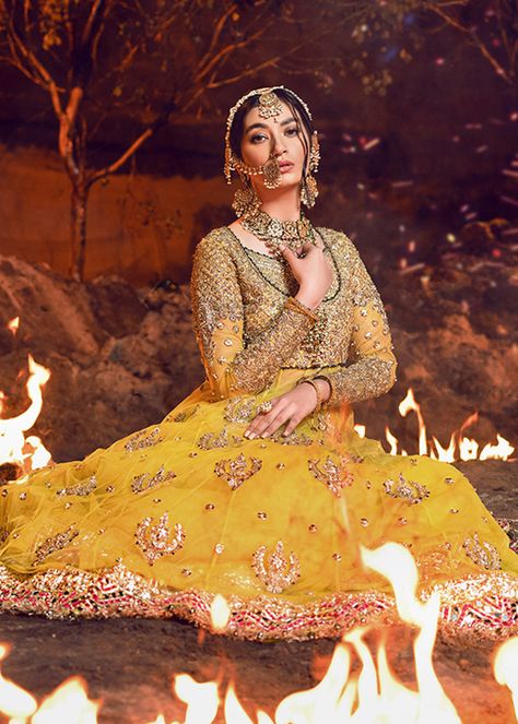 Color: Yellow Fabric: Net Work Technique: Embellished Description: Beautiful and poised, Amber is the perfect pick for tis wedding season as it serves as a homage to the beating heart of Pakistan. This is a 1 piece stitched outfit. Includes: Pishwas Mehndi Suit, Pakistani Frocks, Elegant Lehenga, Pakistani Bridal Dress, Bridal Shirts, Raw Silk Fabric, Lehenga Style, Pakistani Bridal Dresses, Pakistani Bridal Wear