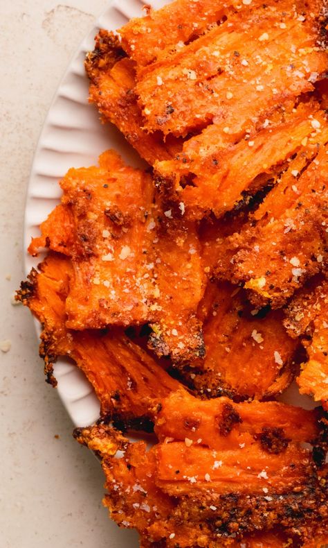 If you're looking for a new twist on a classic side dish, these Crispy Smashed Carrots are about to become your go-to recipe!  With a caramelized, crunchy texture and seasoned with parmesan cheese and garlic powder, these carrots make a delicious side dish addition to any meal or are a perfect appetizer or snack. Smashed Carrots, Caramelized Carrots, Carrots Side Dish, Carrot Chips, Great Dinner Recipes, Carrot Recipes, Vegetable Peeler, Perfect Appetizers, Yummy Sides