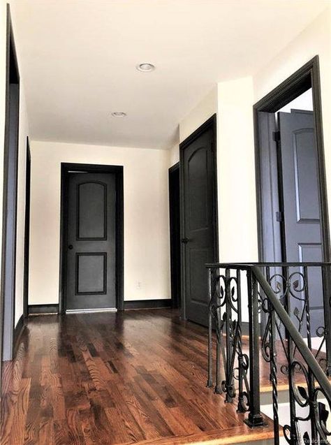 Grey Floors Black Trim, Black Stained Trim Interior, Dark Trim And Light Walls, Black Trim Inside House, Black Trim Interior Living Rooms, Dark Trim Interior, Black Moldings And Trim, Interior Black Trim, Victorian Homestead