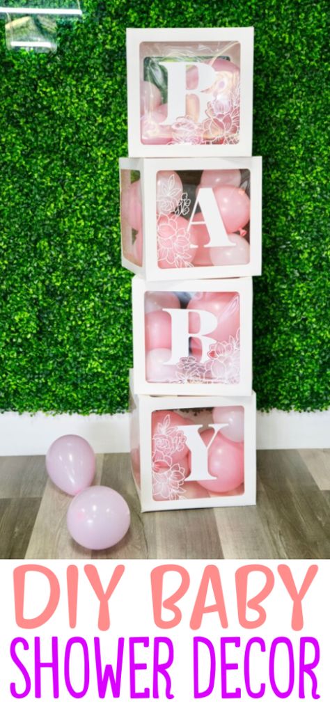 Having a baby shower? We have got a fantastic idea for some DIY baby shower decor. With these balloon boxes you can make adorable, affordable baby shower decorations that you are going to love.This custom baby shower decor is sure to have all your guests raving about how talented you are! You could easily adapt it for other party themes too – graduation, birthday, anniversary, and more. Baby Shower Boxes Decorations, Diy Baby Blocks Decoration, Baby Boxes Decorations, Baby Blocks Baby Shower Diy, Pink And Green Baby Shower Ideas, Baby Shower Cricut Ideas, Cricut Baby Shower Decorations, Easy Diy Baby Shower Decorations, Baby Shower Sign In Ideas