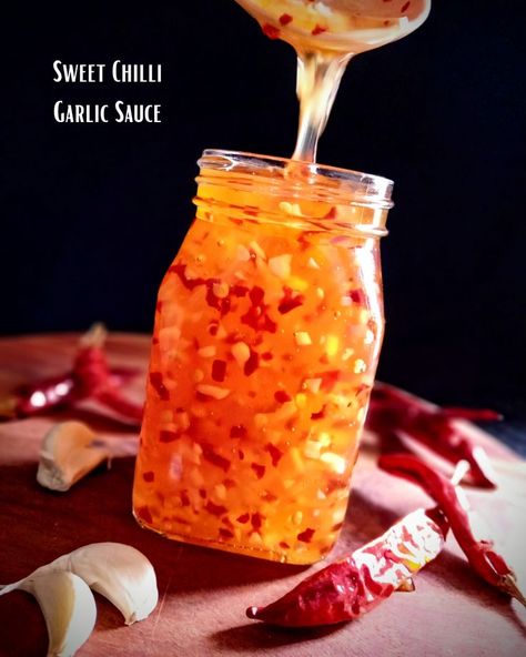 This homemade Sweet Chilli Garlic Sauce is very easy to make & tastes better than store bought one. The flavour is spicy, sweet & garlicky. This Sweet Chilli Garlic Sauce is served as a dipping sauce for Asian snacks like Spring Roll, Wonton, Fried Chicken & Dumplings. You can use this Sauce in Noodles, Fried Rice & Stir Fry recipes. Rice Stir Fry Recipes, Fried Chicken Dumplings, Fried Rice Stir Fry, Chilli Garlic Sauce, Rice Stir Fry, Homemade Chilli, Garlic Sauce Recipe, Natures Bounty, Food Sauces