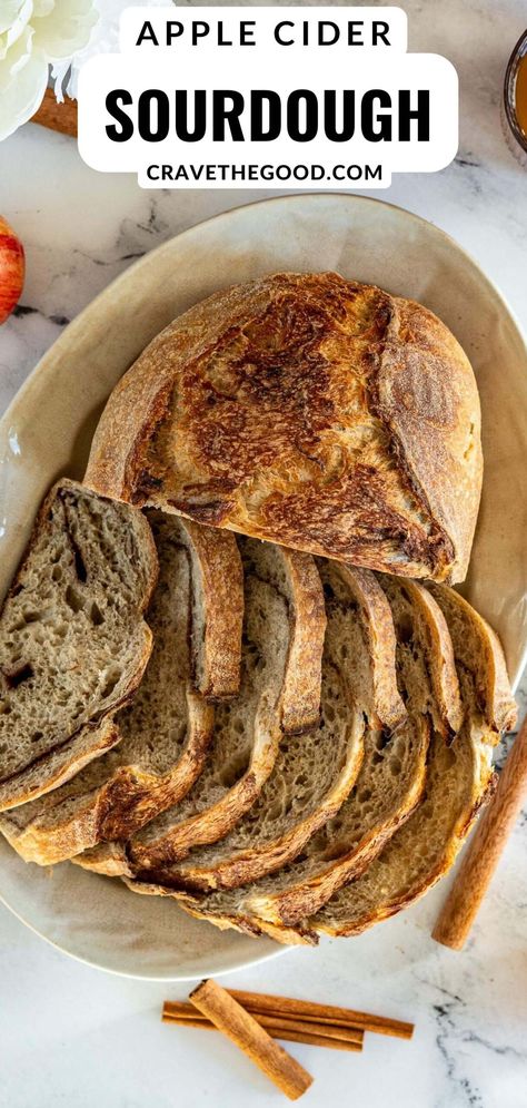 Embrace the cozy charm of autumn with this apple cider sourdough! This aromatic bread is fluffy and studded with fresh apples, capturing the essence of fall in every bite. Perfect for crisp days and cozy evenings, this recipe is a must-try for those who love comforting seasonal flavors. Pin now and savor the warmth of homemade goodness. Sourdough Thanksgiving Recipes Bread, Dutch Oven Apple Bread, Sourdough Apple Cider Cookies, What To Bake Sourdough Bread In, Caramel Apple Sourdough Bread, Fall Sourdough Bread Recipes, Apple Fritter Sourdough Bread, Christmas Sourdough Inclusions, Infused Sourdough Bread