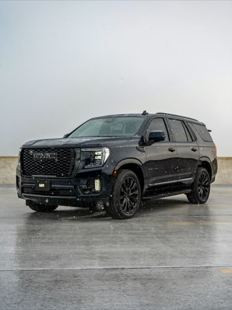 Custom dark blue Yukon Denali with black trim, black powder coat wheels, and tinted windows. 2023 Gmc Yukon Denali, Yukon Car, 2023 Gmc Yukon, Black Tahoe, Mom Cars, Denali Truck, Painted Calipers, Best Suv Cars, Gmc Denali