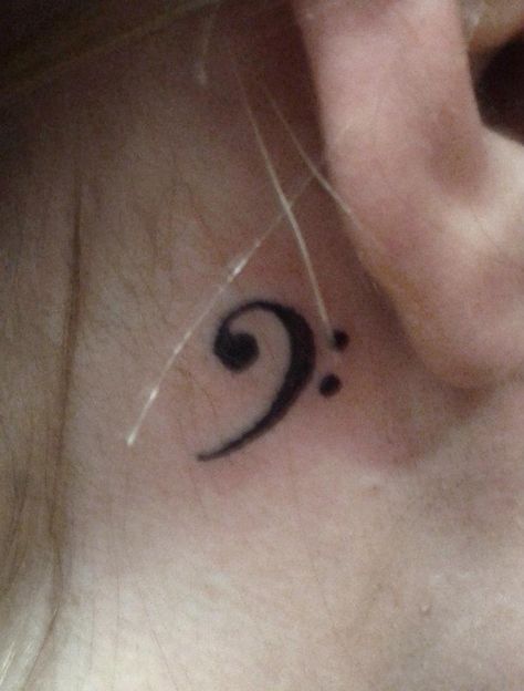 Bass clef tattoo behind the ear by Dez Aster Bass Clef Tattoo, Tattoo Behind The Ear, Clef Tattoo, Aster Tattoo, Wrist Tatoo, Small Foot Tattoos, Tattoo Behind Ear, Music Tattoo Designs, Bass Clef