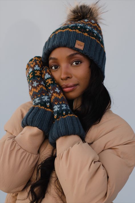 This winter season, stay warm and cozy in style with our new mitten collection. Made from a fleece lining to keep you toasty, these mittens are perfect for cold weather festivities. They even have a matching pom hat for a complete set! Winter Portraits, Knit Mittens, Pom Pom Hat, Fur Pom Pom, Cozy Knits, Knit Hat, Winter Looks, Knitting Materials, Clothes Gift