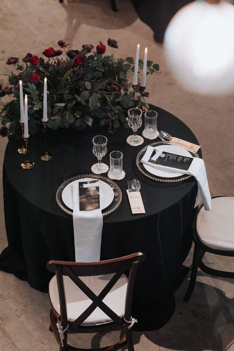 Dark Moody Wedding Round Tables, Black Lace Tablecloth Wedding, Black And White Wedding Bride And Groom Table, Sweetheart Table Wedding Dark And Moody, Black Round Tables Wedding, Black Tablecloth Place Setting, Black Linen Table Decor, Gothic Wedding Sweetheart Table, Wedding Tablescapes Black Tablecloth