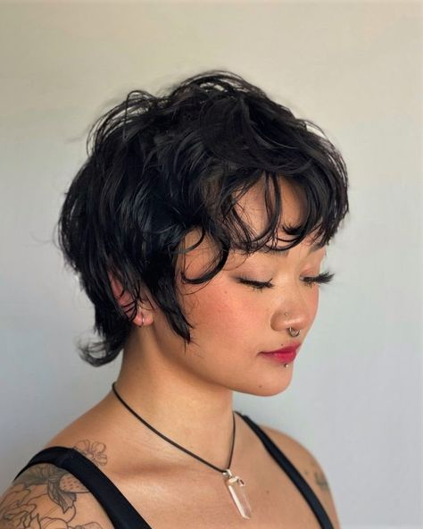 Selena Gomez Pixie Haircut, Pixie Haircut For Wavy Hair Natural, Piercings For Round Faces, Long Pixie Curly Hair, French Pixie Haircut Round Face, Curly Hair Pixie Cut Round Faces, Wavy Short Mullet, Round Face Models, Wavy Long Pixie