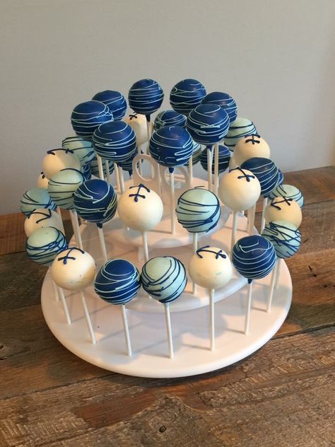 Nautical Baby Shower cake pops Nautical Baby Shower Theme, Nautical Desserts, Ocean Themed Baby Shower Boy, Pool Party Baby Shower Ideas Boy, Nautical Baby Shower Ideas, Shark Baby Shower Ideas, Nautical Dessert Table, Baby Shower Cake Pops For Boys, Nautical Cupcakes