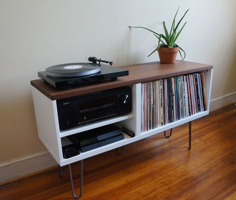 Mid Century Modern Record Console.  Materials: BESTÅ shelf/height extension unit  Starting with a BESTÅ shelf/height extension unit I moved the center divider to the left to accommodate more space for my records and to fit my receiver perfectly. I then cut one shelf down to fit and did not use the other. Instead of using the top I replaced it with some Ipe (a brazilian hardwood) that I made at a local woodshop. I then added some hairpin legs I had from another project. Ikea Mid Century Modern, Modern Record Console, Diy Platform Bed, Apartment Decoration, Diy Ikea Hacks, Vinyl Storage, Home Cinema, Ikea Diy, Diy Tips