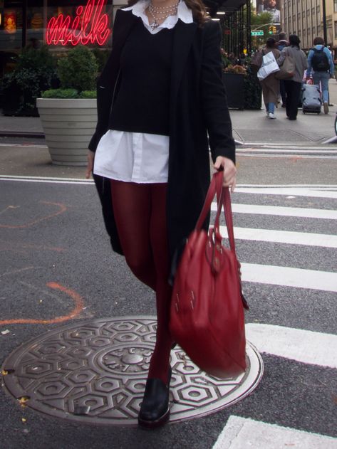 girl in red tights, black coat, red bag, fall outfit, preppy outfit Outfit With Red Tights, Red Tights Outfit 2023, Red Tights Outfit Aesthetic, Colored Stockings Outfit, Outfits With Red Tights, Maroon Tights Outfit, Red Tights Aesthetic, Outfits Red Hair, Aesthetic Preppy Outfits