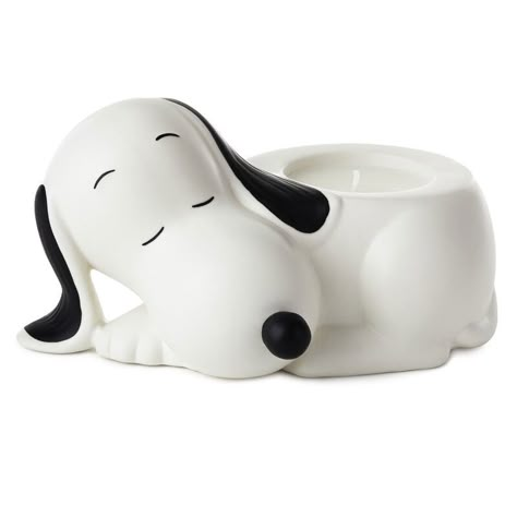 Whether it's the soothing scent of lavender or the charming look of Snoopy peacefully napping, this fun candle is sure to set a tranquil mood wherever you display it. The ceramic sculpture shaped like Charlie Brown's beloved beagle features a 3-ounce lavender-scented candle. Makes a delightful gift for any Peanuts fan. | Peanuts ceramic Snoopy candle features a soy-blend wax scented candle. | Fragrance: Lavender. | Candle: 3 oz. | Sculpted Snoopy: 8" W x 4" H x 5.75" D Snoopy Items, Snoopy Gifts, Lavender Scented Candle, Candle Fragrance, Snoop Dog, Lavender Candle, Charlie Brown And Snoopy, Candle Smell, Peanuts Gang