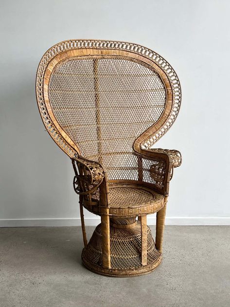 For Sale on 1stDibs - An original example of the iconic “Emmanuelle” peacock chair. The chair features expertly woven wicker and cane with a large-scale fan back, portraying High Back Wicker Chair, Rattan Wingback Chair, Vintage Rattan Chair, Woven Chairs, Rattan Peacock Chair, Office Refresh, Peacock Chairs, Small Sofa Bed, Bookcase With Glass Doors