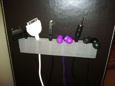 This is cheap - almost free - great cord organizing idea!!!!! This links to instructions. Phone Charger Diy, Diy Chargers, Charger Organizer, Hide Wires, Cord Organizer, Cord Holder, Electronic Gadgets, Cable Holder, Charger Cord