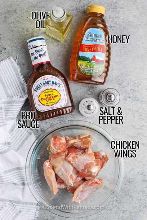 These sweet honey BBQ wings are the meal that the family has been waiting for. Cooked to crispy perfection in the air fryer, these chicken wings will be ready in no time. Then, once the sweet and sticky sauce has been added, it will be so hard to resist these delightfully addictive wings! #honeybbqwings #bakedhoneybbqwings #honeybbqchickenwings #spendwithpennies Honey Bbq Wings Air Fryer, Air Fryer Baked Chicken Wings, Bbq Chicken Wings In Air Fryer, Bbq Wings In Air Fryer, Chicken Wing Recipes Air Fryer, Honey Barbeque Wings, Easy Bbq Wings, Barbeque Chicken Wings, Honey Barbeque Chicken