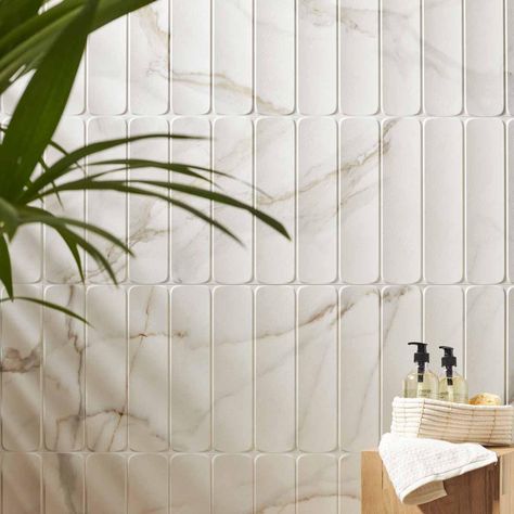 Panorama Gold Marbled Column Ceramic Tile 16x48 | Tile Club Linear Tile Bathroom, Fluted Tile Shower Wall, Unique Tile Layout, Fun Shower Tile, Fluted Tile Bathroom, Harringbone Tile, Fluted Tile, Tile Around Tub, Textured Tiles Wall