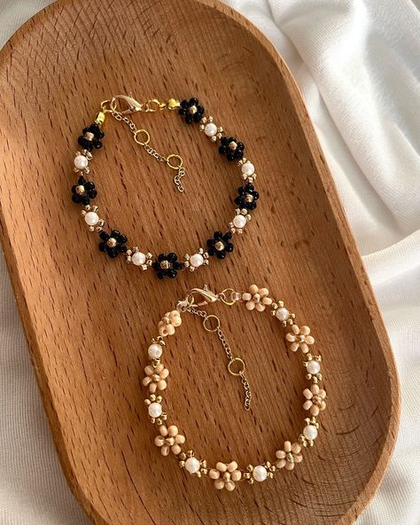 🖤🥂🪩 Black/ Champagne Flower with Pearl bracelet is on Etsy! Bracelets are available in gold/silver bead. Details: 🤍 Length: 13-17cm long (open for customisation!) 🤍 2/3mm TOHO beads Check out our Etsy shop via the link in bio <3 (don’t forget to use the 20%off code! #handmade #jewellery #jewelry #aus #smallbusiness #smallbusinessaustralia #bracelets #handmadejewelry #handmadebracelet #handmadebracelets #smallbusinesssupport #bracelet #handmade #handmadecrafts #handmadejewellery #cutebrace... Bow Beaded Bracelet, Beaded Bracelets For Boyfriend, Seed Bead Bracelets Flower, Handmade Jewelry Diy Bracelets, Flower Beads Bracelet, Bead Flower Bracelet, Handmade Accessories Ideas, Seed Bead Bracelets Diy, Beaded Flower Bracelet