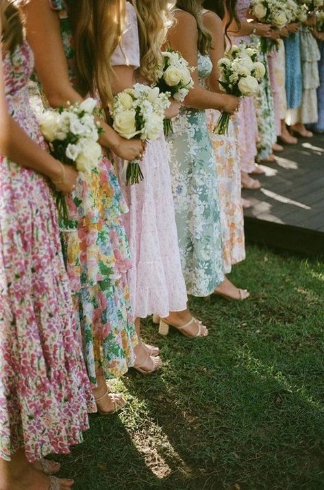 Bridal Party Floral Dresses, Special Things To Do At Your Wedding, Bridesmaids In Floral Dresses, Mismatched Floral Bridesmaids, Mid Matched Bridesmaids, Colorful Floral Bridesmaid Dresses, Different Floral Bridesmaid Dresses, Un Traditional Wedding Ideas, Pastel Floral Dress Bridesmaid