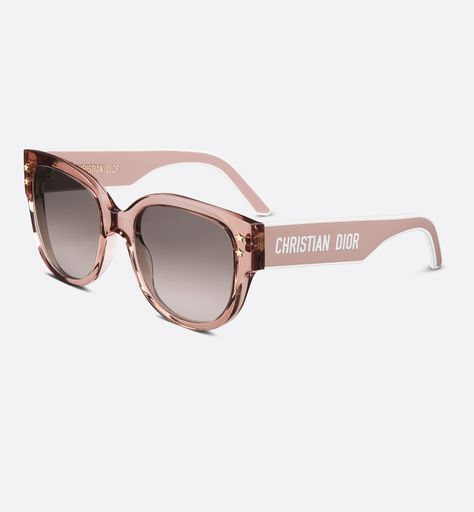 The DiorPacific B2I sunglasses are a modern butterfly design. The transparent pink acetate frame is adorned with gold-finish star details on the front, while the acetate temples present a pink and white double-layer effect showcasing the Christian Dior signature. Completed by gray-to-purple gradient lenses, the new essential style will lend a contemporary touch to any look. Purple Lenses, Denim Swimsuit, Dior Star, Christian Dior Fashion, Dior Book Tote, Christian Dior Couture, Dior Fashion, Dior Sunglasses, Butterfly Sunglasses