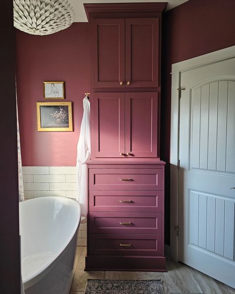 Still can't get over our master bath renovation! . . . . . . . #oneroomchallenge #primarybathroom #bathroomdesign #homerenovations #orcat #moodycolors #whimsical #englishcottage #bathroom Raspberry Bathroom, Purple Tile Bathroom, Bathroom Paint Ideas, Mauve Bathroom, Plum Bathroom, Purple Cabinets, Porcelain Tub, Bathroom Cabinet Colors, Purple Tile