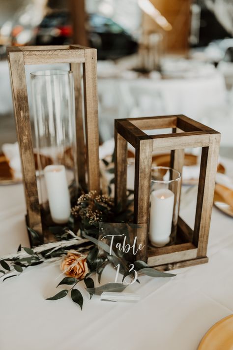 Wooden Wedding Lanterns, Wood Candle Centerpiece Wedding, Square Wood Centerpieces Wedding, Simple Wedding Centerpieces Lanterns, Simple Cheap Centerpieces Wedding, Navy And Rust Table Decor, Lantern Fairy Lights Centerpiece, Wood Lantern Table Centerpieces, Rustic Lantern Wedding Centerpieces