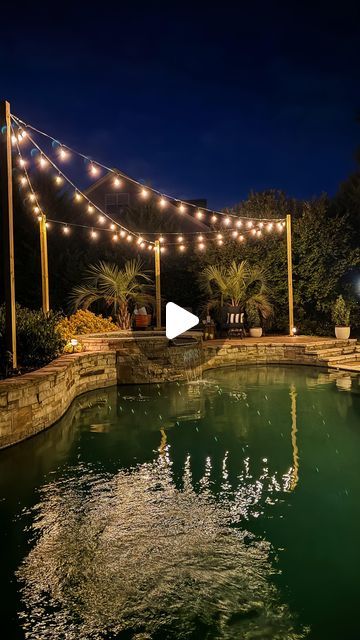 AnnMarie Christiano & Anne Zirkle | Simply2Moms on Instagram: "⭐️ We partnered with @aqlighting to add string lights over the upper patio around Anne’s pool and spa. 💡 This area has always been dark, and adding string lights is the perfect solution! 💡 👉🏼 Here are 3 mistakes to avoid when you hang string lights near water: 1️⃣ Don’t use glass bulbs! Always use plastic bulbs around a pool to prevent shattered glass from getting in the pool if a bulb breaks. AQ Lighting has plastic bulbs as an option for their string lights. Best part? The bulbs are treated with a UV protectant so they won’t yellow over time. 2️⃣ Always use a GFI outlet around water. After all: electricity + water could be deadly… 3️⃣ Make sure the posts to hold the string lights are installed securely around a pool. T Backyard Lighting Ideas With Pool, How To Decorate Around Pool Area, Hanging Lights Over Pool, Backyard Pool Lighting Ideas, Lights Around Pool Ideas, Pool Area Lighting Ideas, Outdoor Lighting Around Pool, String Lights Above Pool, Back Yard String Lights Outdoor