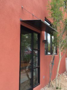 Commercial steel shade plates Modern Steel Awning, Steel Awning Ideas, Metal Awning Over Door, Metal Awnings Over Doors, Deck Overhang, Metal Door Canopy, Steel Awning, Entry Awning, Covered Walkways