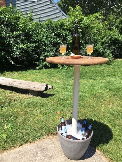 Or if a beer table stand is more your speed, you can craft one out of a big cement planter that doubles as a beer cooler. Behr Exterior Paint, Solar Light Chandelier, End Table Makeover, Beer Table, Beer Cooler, Easy Backyard, Stock Tank, Cement Planters, Outdoor Light Fixtures