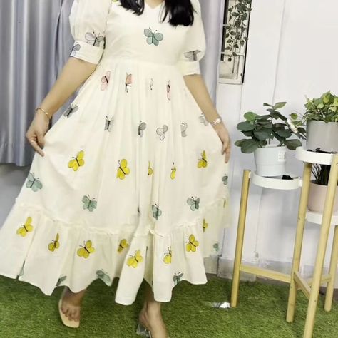 Look stylish and walk in comfort with our New white 🤍 colour Midi dress with stylish puff sleeves with butterfly 🦋 embroidery all over the dress. 🧶 *Fabric - cotton with lining* 👗 *_Type - midi kurti_* 🧵 *Work - puff sleeves & full embroidery work front & back side* 📏 *Size - 38/40/42/44/46* DM for orders #mididress #dress #cottondress #butterflydress #embroiderydress #whitedresses #happyshopping #OnlineShopping #FreeShipping Butterfly Hands For Blouses, Butterfly Hands For Long Frocks, Summer Party Dress With Butterfly Embroidery, White Cotton Tops With Butterfly Embroidery, White Cotton Top With Butterfly Print, Cotton Frock, Butterfly Embroidery, Butterfly Dress, Look Stylish