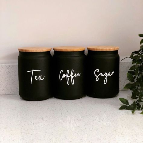 Black Accessories Kitchen, Black White Kitchen Decor Ideas, Black And Grey Kitchen Ideas Decor, Beige And Black Kitchen Decor, Black Farmhouse Kitchen Decor, Black Canisters For Kitchen, Black Home Organization, Black Kitchen Supplies, Black And Wood Kitchen Accessories