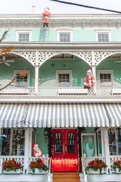 A great way to get into the holiday spirit in New Jersey is to experience Christmas in Cape May. Discover the best Cape May Christmas events and activities for one of the best places to spend Christmas in New Jersey. | cape may Christmas lights | cape may new jersey Christmas | Christmas in cape may NJ | cape may at Christmas Christmas In Cape May Nj, Cape May New Jersey Christmas, Cape May Christmas, Cape May New Jersey, Winter Travel Destinations, Usa Destinations, East Coast Road Trip, Cape May Nj, Stone Harbor