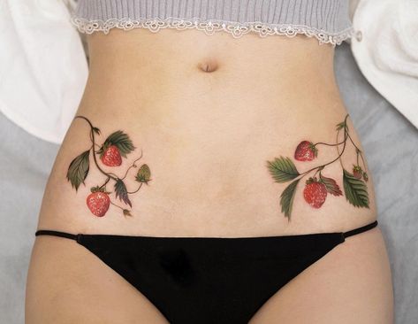 Stomach Tattoos Floral, Cute Pinup Tattoo, Womb Tattoo Aesthetic, Strawberry Shoulder Tattoo, Strawberry Hip Tattoo, Strawberry Bush Tattoo, Top Surgery Tattoo Ideas, Low Waist Tattoo, Tattoo Ideas Strawberry