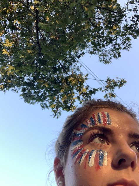 America Student Section Theme, July 4th Leg Painting, Fnl Face Paint Aesthetic, 4th Of July Simple Makeup Looks, Forth Of July Body Art, Forth Of July Makeup Simple, Fourth Of July Face Paint Adult, Flag Face Painting Ideas, 4th Of July Easy Makeup