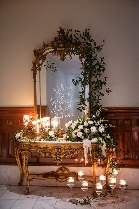 Fiona + Julian - Real Wedding - Weddings in Houston Mirror With Greenery, Evening Wedding Decor, Driskill Hotel Wedding, Wedding Welcome Mirror, Timeless Spring Wedding, Wedding Entrance Table, Welcome Mirror, Victorian Wedding Themes, Wedding Welcome Table