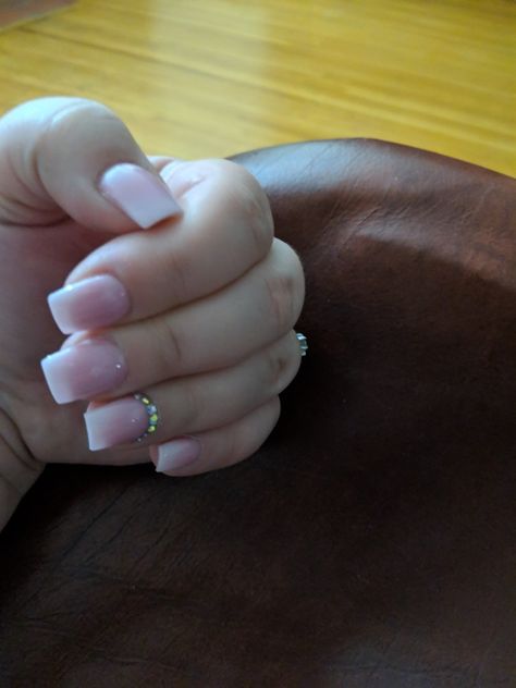 Dip pink nail, gems on ring finger so perfect Pink Nails With Ring Finger Design, Ring Finger Cup, Pink Ring Finger Nail Design, Heart On Ring Finger Nail, Big Middle Finger Ring, Nail Ring, Ring Finger, Wedding Nails, Pink Nails