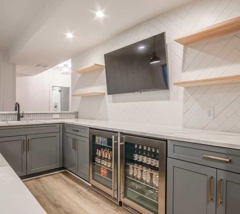 Basement Wrap Around Bar Ideas, Wall Bar Basement, Basement Bar Grey Cabinets, White Cabinet Wet Bar Ideas, Neutral Finished Basement, Small Basement Wet Bar With Full Size Fridge, Basement Bar U Shape, Shiplap Wall In Basement, Basement Bar Fridge