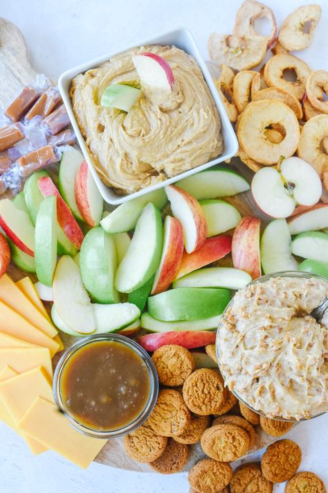 School's back and this Fall Snack Board is full of apple and caramel goodness.  It's the perfect way to welcome the kiddos home from school or to welcome your guests to any fall holiday parties you may be hosting or attending. #cheeseboard #snackboard #apples #cheese #caramel #charcuterie #easy #traderjoes #howtomakea #wooden #simple #fall Apples Charcuterie Board, Apple And Cheese Charcuterie Board, Halloween Charcuterie Board Carmel Apple, Apple And Cheese Board, Charcuterie Board Ideas For Fall, Fall Snack Platter, Fall Apple Charcuterie Board, Apple Cheese Board, Fall Charcuterie Cup Ideas