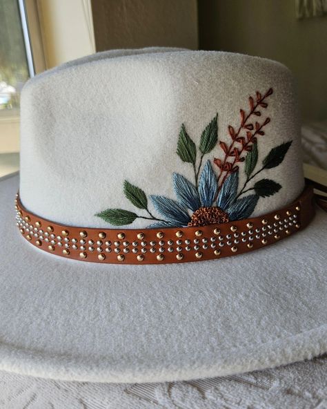 The finished hat! I'm super proud of this piece as I've always wanted to embroider this type of hat. My hand and fingers definitely took a meeting while embroidering this material, but I think it was worth it. I did finish one more hat before I left for my trip so I can't wait to show you that one too! What do you think? . . . . . . . . . #embroidereverything #embroiderersofinstagram #hats #fiberartist #floralart #loveflorals #miniatureembroideryartist Round Embroidery Pattern, How To Embroider A Hat By Hand, Embroidered Wide Brim Hat, What To Do With Finished Embroidery Projects, Embroidered Fedora Hat, Felt Hat Embroidery, Embroidered Hat Diy, Embroidered Felt Hat, Hand Embroidered Hats