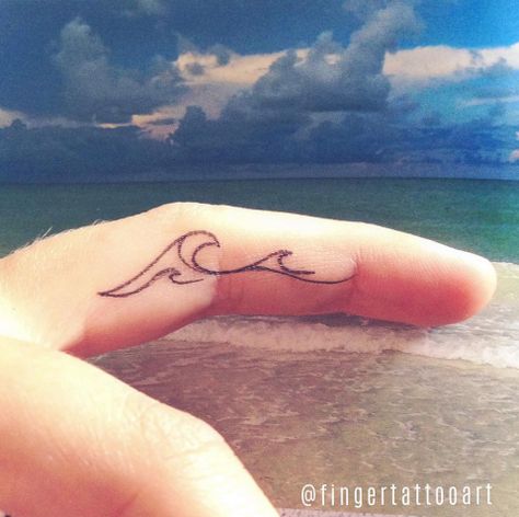 Beach lovers will flip for this wave tattoo. Wave Finger Tattoo, Water Tattoos, Tiny Finger Tattoos, Ocean Tattoo, Finger Tats, Wave Tattoo, Water Tattoo, Tattoo Zeichnungen, Ocean Tattoos