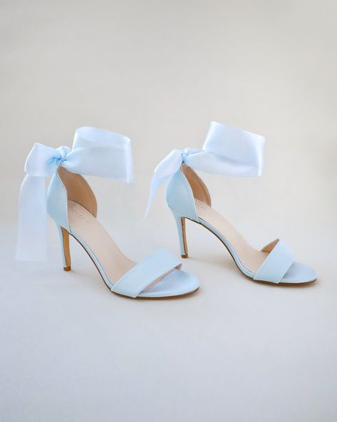 "Classic satin high heel sandals adorned adorned with matching satin or sheer ribbons that ties to an oversized bow around ankle to add dancerly grace to any ensemble. The light blue color can easily be your something blue. Simple and easy wear for bridal wear, bridesmaids, holiday party, wedding parties, and any special occasions.  DETAILS: HEEL HEIGHT: 3.5 Inches COLORS AVAILABLE: Ivory, Light Blue, Champagne, White, Fuchsia UPPER: Synthetic upper and lining MATERIALS: Manmade outsole STYLE NAME: DEMI Not sure of which size to purchase? Shoes measurements are as follow: (Please note measurements taken the length of inside of shoe from toe to heel). Size 6 - 9.25\" Size 7 - 9.5\" Size 8 - 9.75\" Size 9 - 10\" Size 10 - 10.25\" Size 11 - 10.5\" Please note all these info are intended for g Blue Champagne, Something Blue Bridal, Flower Girl Shoes, Blue Wedding Shoes, Bridal Flats, Wedding Shoes Bride, Satin Shoes, Wedding Guest Shoes, Wedding Sandals