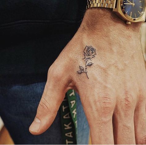 Rose Finger Tattoo Men, Small Rose Tattoo Men Hand, Deep Tattoo Ideas Men, Rose On Thumb Tattoo, Minimalist Hand Tattoo Men, Rose Tattoo Men Leg, Side Of Hand Tattoo Men, Hand Rose Tattoo Men, Rose Thumb Tattoo