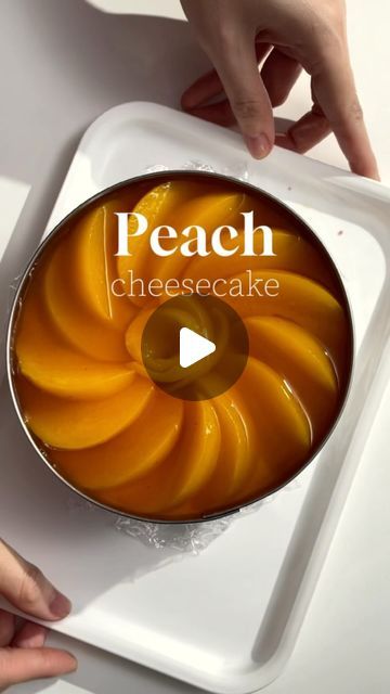 79K views · 7.5K likes | Vy Khue on Instagram: "Do you think peaches really have flavor? To me, its scent is not really clear, but the taste is worth trying when combined with cheesecake. I think this cheesecake is suitable for this weather, the color is beautiful and it melts when put in the mouth. For the peach tea, I used pre-purchased tea, so when converting the recipe, use the available peach tea powder packet and mix it according to the ratio on the packaging and take the quantity of this recipe.  Mold 14cm 90gr cookies (pink) 30g unsalted butter 200gr cream cheese 30g sugar 6gr gelatin + 36gr water 200gr whipping cream 3g lemon juice Or peach tea Refrigerate for 30 minutes Peach jelly: 100gr peach tea  4gr gelatin + 24gr water And after that, refrid for 2-3 hours before taste it. Su Peach Mousse, Peach Jello, Jello Cheesecake, Peach Jelly, Mini Bundt, Mini Bundt Cakes, Peach Tea, Mousse Recipes, Whipping Cream