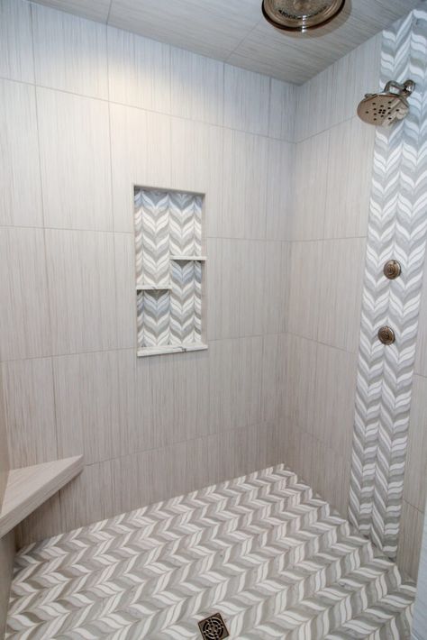 Bathroom White Subway Tile Ideas, Walk In Shower Tile Ideas Waterfall, Shower With Chevron Tile, Tile Shower With Vertical Accent Stripe, Shower Tile Band Ideas, White Shower With Accent Tile, Glass Accent Tile Bathroom Shower Walls, Bathroom Shower Accent Tile, Shower Vertical Accent Tile