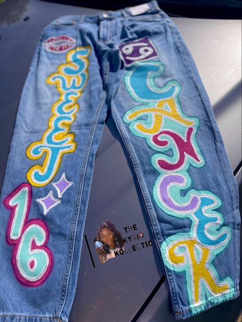 Customized Birthday Jeans, Zodiac Pants Photoshoot, Zodiac Sign Pants Photoshoot, Custom Jean Birthday Outfits, Birthday Pants Ideas, Sweet 16 Poses Photography Picture Ideas, Spray Paint Birthday Outfit, Sweet 16 Custom Outfits, Painted Birthday Pants