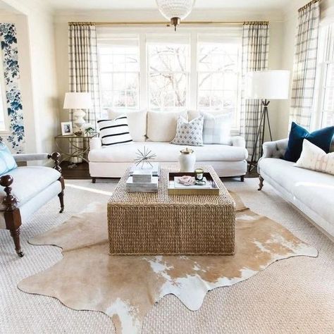 A rug above the rest where a layered cowhide takes center stage, adding depth and dimension to the living room's rustic-chic vibe, and tying together the entire space with its earthy tones and organic texture Explore variety of natural cowhides at our store🛍 Ebay: www.ebay.com/str/storeera 🛒 Etsy: www.etsy.com/shop/storeera 🛒 🔗Link in bio #cowhiderug #cowprint #arearug #interiordesign #diyrug #cowhide #cow #braziliancowhide #genuinerug #interiordesign #interiordesignideas #floorrug #inter... Hide Rug Living Room, Layered Cowhide Rug, Cowhide Rug Living Room, Living Room Classic, Interior Simple, Coastal Living Rooms, Layered Rugs, Cowhide Rug, Décor Diy